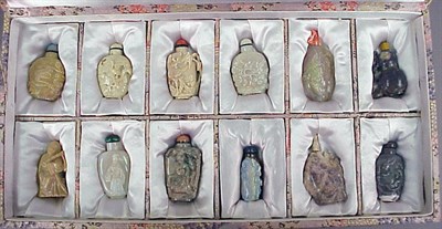 Lot 89 - Twelve Chinese Carved Opal Snuff Bottles