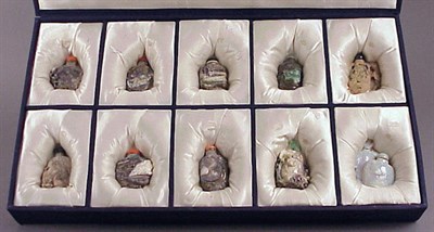 Lot 92 - Ten Chinese Carved Opal Snuff Bottles