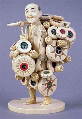Lot 95 - Japanese Inlaid Ivory Figure of a Drum Peddler
