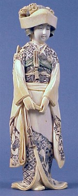 Lot 97 - Japanese Engraved and Stained Ivory Figure of...