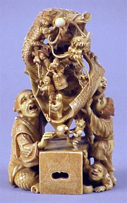 Lot 98 - Japanese Ivory Carving of a Conjuror with a...