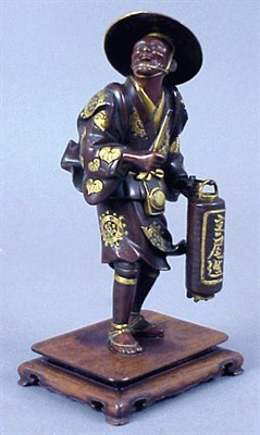 Lot 100 - Japanese Miya-O Style Bronze of a Porter with...
