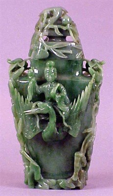 Lot 589 - Chinese Green Jade Vase Deeply Carved with an...