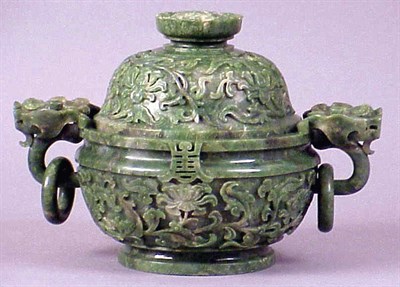 Lot 107 - Chinese Mottled and Elaborately Carved Green...