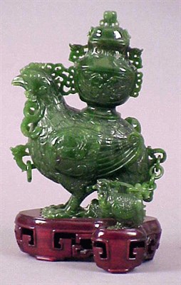 Lot 590 - Chinese Dark Green Jade Archaistic Bird-Form...