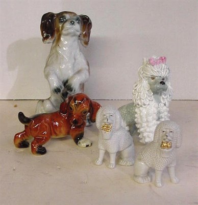 Lot 15 - Five Porcelain Figurines, including three...