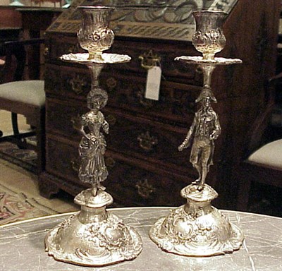 Lot 331 - Pair of Silver Plated Figural Candlesticks