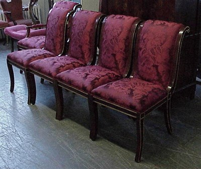 Lot 267 - Set of Eight Regency Style Mahogany Dining...