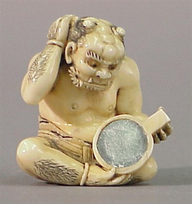 Lot 582 - Good Japanese Ivory Okimono of an Oni Gazing...