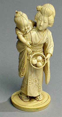 Lot 122 - Ivory Group of a Woman and Child Meiji Period...