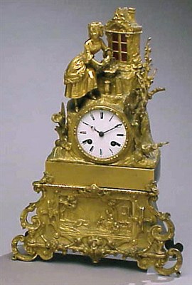 Lot 603 - Empire Gilt-Bronze Clock The dial surmounted...