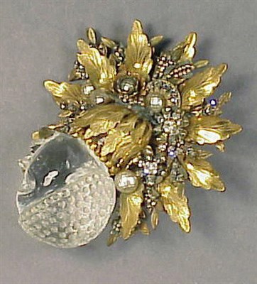 Lot 165 - Miriam Haskell Pin A woman's head atop a spray...