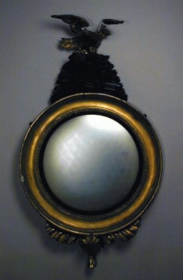Lot 589 - Regency Gilt-Wood and Ebonized Convex Mirror...