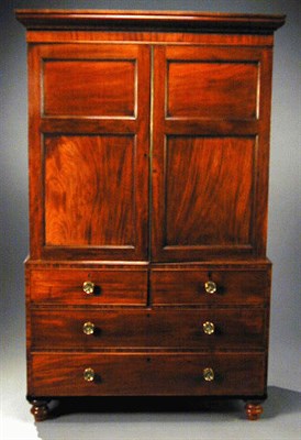Lot 600 - Regency Mahogany Linen Press In two parts, the...