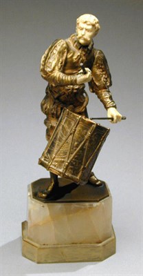 Lot 663 - Gilt-Bronze and Ivory Figure of a Drummer The...