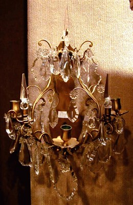 Lot 547 - Pair of Rococo Style Brass Three-Light Sconces