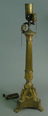 Lot 621 - Empire Style Gilt-Metal Lamp The columnar...