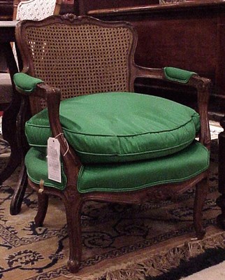 Lot 90 - Louis XV Style Fruitwood and Cane-Inset Armchair