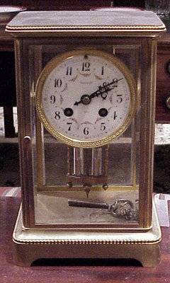 Lot 128 - Mercury Pendulum Gilt-Brass and Glass Clock