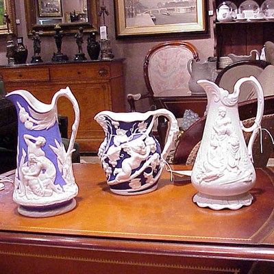 Lot 403 - Group of Three Parian Ewers