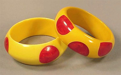 Lot 461 - Two Bakelite Dot Bracelets One with eight dots,...