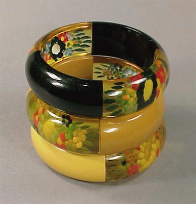 Lot 460 - Group of Three Bakelite Reverse Carved and...