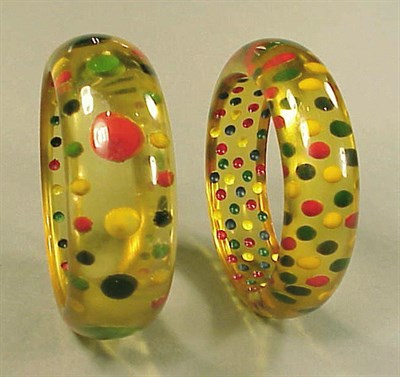 Lot 467 - Two Bakelite Reverse Carved and Painted Dot...