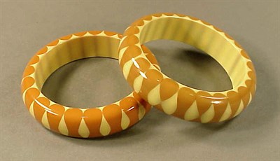 Lot 400 - Two Bakelite Bow Tie Bracelets Each in cream...