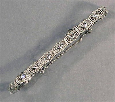 Lot 369 - Gold Filigree Bracelet 14 kt. white gold, the...