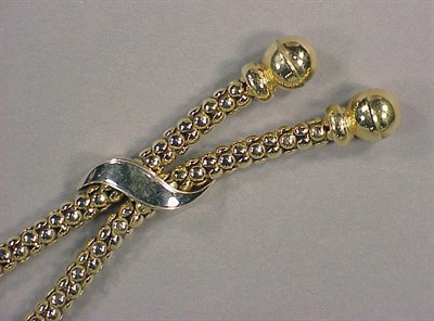 Lot 284 - Gold Lariat 14 kt. yellow gold, designed as a...