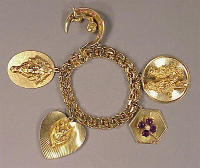 Lot 162 - Gold Charm Bracelet 14 kt. yellow gold, the...