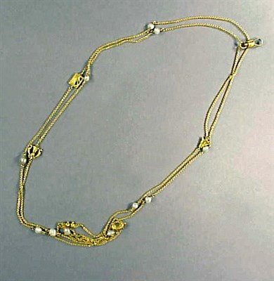 Lot 287 - Gold and Freshwater Pearl Long Chain 14 kt....