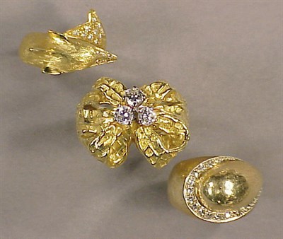 Lot 302 - Three Diamond Rings Comprising two 18 kt. and...