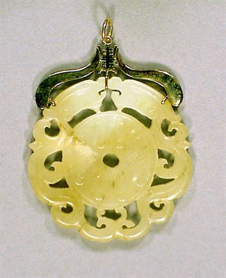 Lot 8 - Carved Jade Pendant Mounted in 14 kt. yellow...