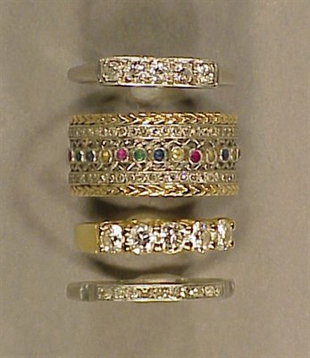 Lot 303 - Four Assorted Gold and Diamond Rings...