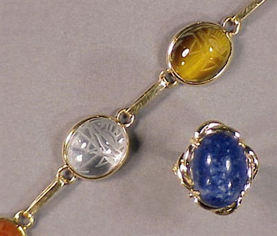 Lot 30 - Scarab Bracelet and Lapis Lazuli Ring 14 kt....
