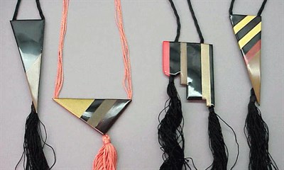Lot 85 - Group of Four Art Deco Geometric Pendant...