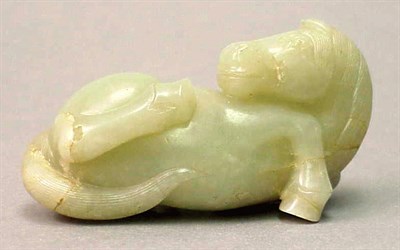 Lot 305 - Pale Green Jade Model of a Recumbent Horse...