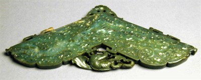 Lot 300 - Carved Dark Green Jade Chime-Form Pendant...