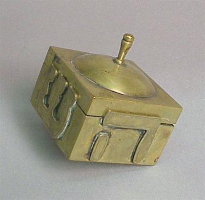 Lot 319 - Silver Dreidel The sides set with reliefs of...
