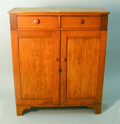 Lot 241 - American Pine Cupboard The plain cornice above...