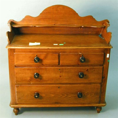 Lot 204 - American Pine Washstand The scrolling...