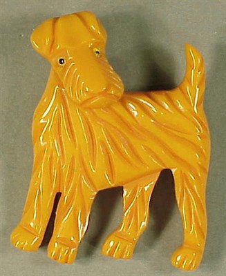 Lot 429 - Bakelite Pivoting Brooch Depicting a dog with...