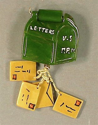 Lot 477 - Bakelite United States Mail Brooch Depicting a...
