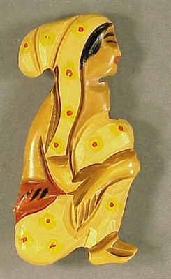 Lot 455 - Bakelite Brooch Depicting a seated South...