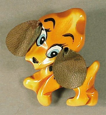 Lot 423 - Bakelite Brooch Depicting a puppy with leather...