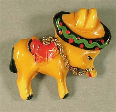 Lot 432 - Bakelite Brooch Depicting a mule with a...