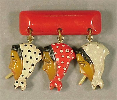 Lot 451 - Bakelite Brooch Depicting a bar suspending...