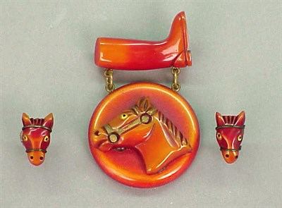 Lot 435 - Bakelite Brooch Depicting a boot suspending a...
