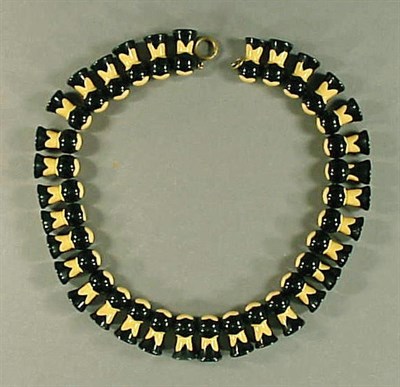 Lot 412 - Bakelite Dot Necklace Each segment of tassel...